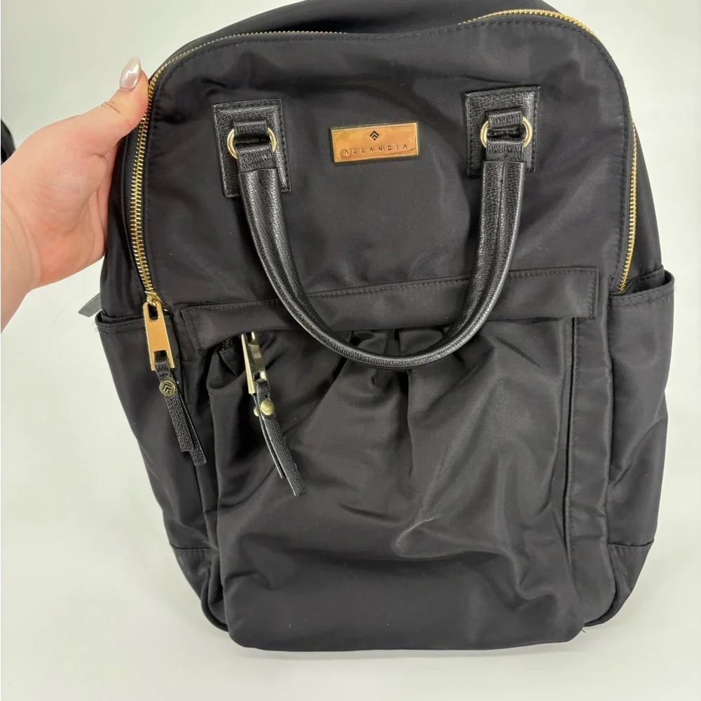 Allancia Black Dome Backpack with Leather Handles and Gold Hardware